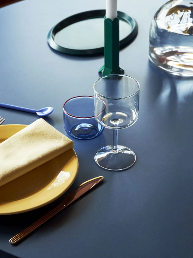 Tint Wineglass clear_Tint Glass light blue with red rim_Arcs Candleholder L green_Contour Napkin lemon.jpg
