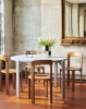 Rey Chair golden wb lacquer beech_Rey Dining Table gull laminate slate blue wb lacquer beech base_Arcs Vase mirror.jpg