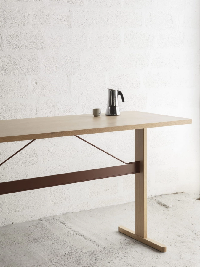 Passerelle High Table wb lacquered oak frame and edge burgundy powder coated crossbar.jpg