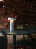 22956-en-ease-portable-lamp-light-blue-linear-steel-dark-green-cafe-table-o70-side-chair-muuto-org.tif.jpeg