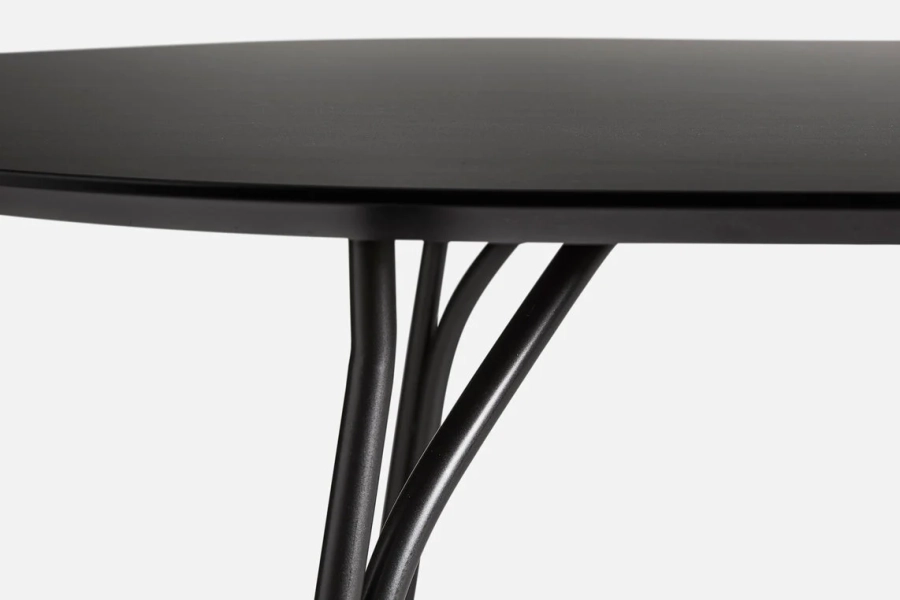 110240_WOUD_Treediningtable_Blackblack_fd318dd4-1bbc-415d-a8e1-7e3e7f577724_1142x762.jpg.webp