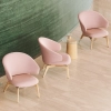 fritz-hansen-let-chairs-and-stub-tables-in-lobby-detail.webp