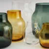 23716-en-silent-vase-family-clear-burnt-orange-dark-greeen-muuto-5000x5000-hi-res.webp