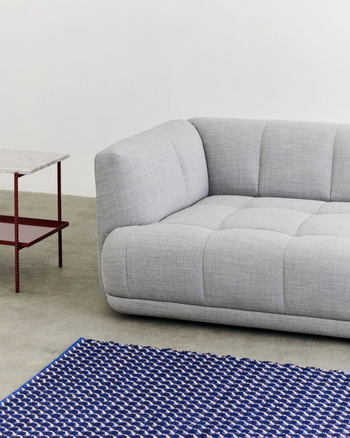 Rebar Side Table L75xW44xH55 grey marble tabletop barn red powder_Quilton comb 10 left Remix 123_Channel Rug 140x200 blue white.jpg