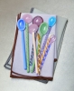 Glass Spoons family_Contour Napkin lavender_Contour Napkin grey.jpg