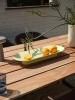 26100-en-mere-bowl-light-green-70-70-outdoor-table-sapele-mahogany-fiber-outdoor-armchair-brown-green-ease-taupe-kink-muuto-org.webp
