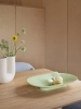 26101-en-mere-bowl-light-green-70-70-oak-255x108-fiber-soft-armchair-ecriture-710-kink-muuto-org.webp