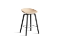 AA001-D126-AA51_AAS 32 H65 pale peach 2.0 shell_black wb laquered oak base_stainless steel footrest.jpg