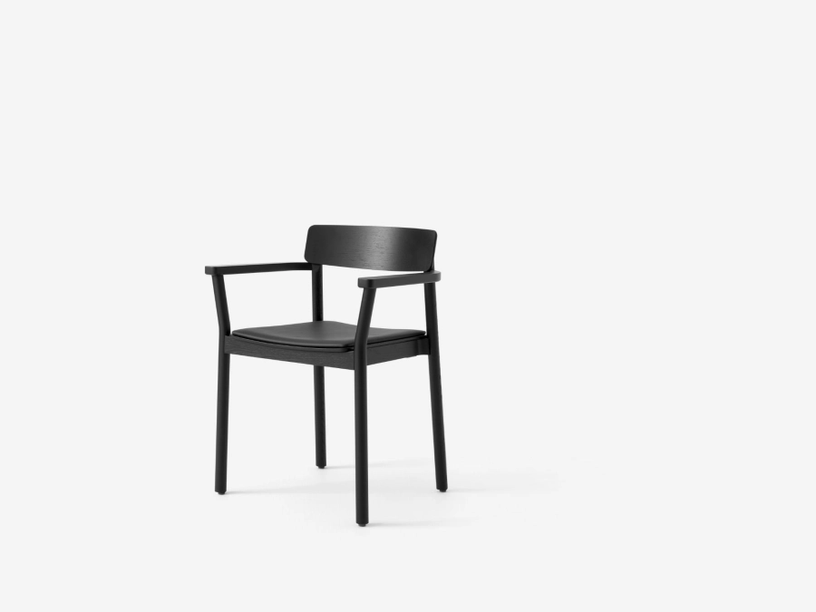 Betty TK11_Black lacquered oak w. noble black leather_ angled front.jpg
