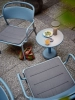 27824-en-linear-steel-lounge-armchair-pale-blue-seat-pad-dark-grey-coffee-table-42-h47-pale-blue-ease-taupe-muuto-org-2.webp