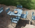 19387-en-linear-steel-cafe-table-70x70-h73-side-chair-armchair-pale-blue-raise-carafe-glass-platform-tray-muuto-org.webp