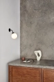 nuura_apiales-wall-satin-black-hard-wired_lifestyle_1.jpg.webp