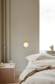 nuura_apiales-wall-brushed-brass_lifestyle_1.jpg.webp