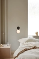 nuura_apiales-wall-satin-black_lifestyle_1.jpg.webp