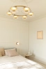 nuura-liila-1-small-wall-lamp-black-opal-bedroom-light.jpg.webp