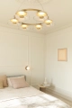 nuura-liila-1-small-wall-lamp-black-opal-bedroom-light.jpg.webp