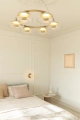 nuura-liila-1-small-bedroom-wall-lamp-black-metal-optic-glass.jpg.webp