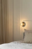 nuura-liila-1-small-bedside-wall-lamp-black-optic-glass.jpg.webp