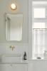 nuura-liila-1-small-bathroom-wall-lamp-nordic-gold-opal-ip44.jpg.webp