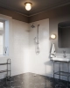 nuura_liila-1-medium_nordic-gold_opal-white_bathroom_2.jpg.webp