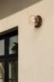 nuura-liila-1-outdoor-facade-wall-lamp-dark-bronze-aw22.jpg.webp