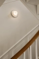 nuura-liila-muuse-small-staircase-white-wall-lamps-closeup.jpg.webp