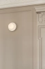 nuura-liila-muuse-small-white-wall-lamp-closeup-details.jpg.webp