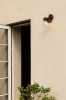 nuura-liila-wall-outdoor-lamp-dark-bronze-optic-clear-aw22.jpg.webp