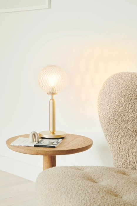 nuura_lifestyle_miira-table-brass-optic.jpg.webp