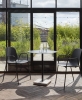 13Eighty Armchair soft black shell graphite black steel base_Terrazzo Table Round anthracite grey base_Glass Jug.jpg
