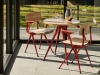 Result Armchair tomato red armreat and frame_Pyramid Cafe Table 21 wb lacquered oak tabletop tomato red frame_Indian Steel Pitcher No. 2.jpg