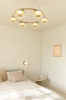 nuura-blossi-6-round-chandelier-master-bedroom.jpg.webp