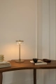 nuura-blossi-table-small-nordic-gold-metal-clear-glass-console-lamp-dimmable-on.jpg.webp