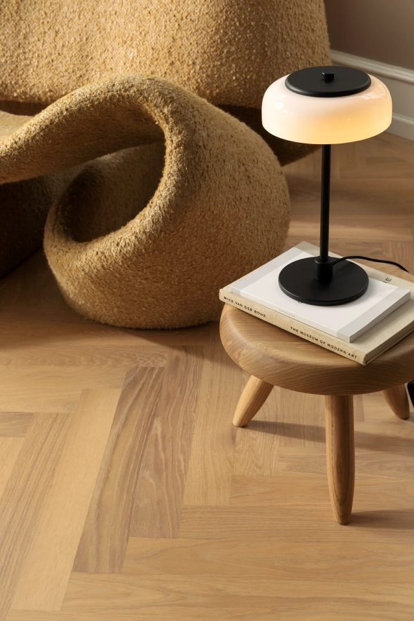 nuura-blossi-table-small-black-metal-opal-glass-lamp-dimmable-on.jpg.webp