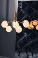 nuura_apiales-9_brushed-brass-finish_opal-white-glass_lifestyle_2.jpg.webp