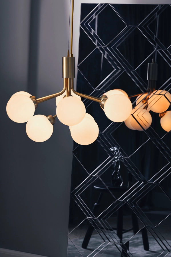 nuura_apiales-9_brushed-brass-finish_opal-white-glass_lifestyle_2.jpg.webp