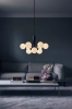 nuura_-apiales-9_satin-black-finish_opal-white-glass_lifestyle_1.jpg.webp