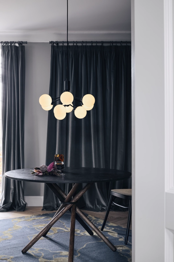 nuura_-apiales-9_satin-black-finish_opal-white-glass_lifestyle_2.jpg.webp