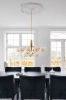 nuura_apiales-18_brushed-brass-finish_opal-white-glass_lifestyle_1.jpg.webp
