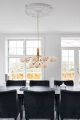 nuura_apiales-18_brushed-brass-finish_opal-white-glass_lifestyle_1.jpg.webp