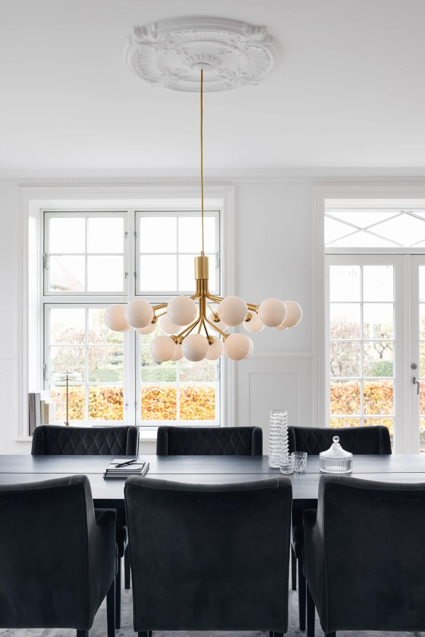 nuura_apiales-18_brushed-brass-finish_opal-white-glass_lifestyle_1.jpg.webp
