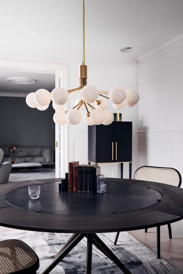 nuura_apiales-18_brushed-brass-finish_opal-white-glass_lifestyle_3.jpg.webp