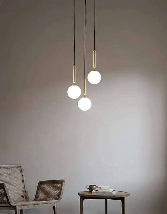 nuura_miira_3_brass_opal_white_lifestyle_72dpi.jpg.webp