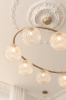 nuura-miira-8-oval-chandelier-nordic-gold-optic-clear-glass-details.jpg.webp