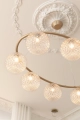 nuura-miira-8-oval-chandelier-nordic-gold-optic-clear-glass-details.jpg.webp