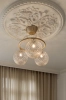 nuura-miira-3-bedroom-chandelier-optic-glass-centerpiece-closeup.jpg.webp