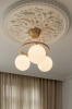 nuura-miira-3-chandelier-bedroom-ceiling-centerpiece-brass-closeup.jpg.webp