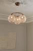nuura-miira-3-small-chandelier-optic-glass-dark-bronze.jpg.webp