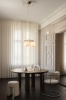 nuura-miira-3-circular-chandelier-round-table.jpg.webp