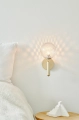 nuura_lifestyle_miira-wall-brass-optic_1.jpg.webp